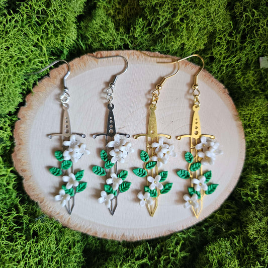 White Blossom Floral Fantasy Sword Clay Earrings