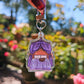 Black Cat Resting on Whimsical Bed Acrylic Keychain